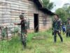 Cegah Malaria, Satgas Yonif 144/JY Bersama Puskesmas Laksanakan Penyemprotan IRS di Kampung Naga